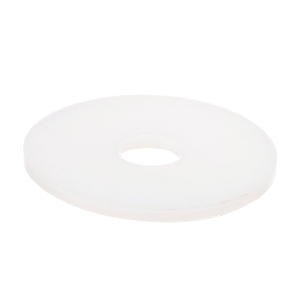 A white round friction pad with a hole.