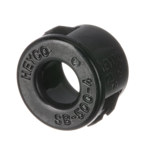 A black rubber Heyco grommet.