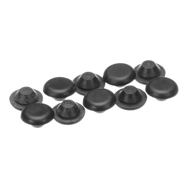 A group of black round rubber bump inserts.