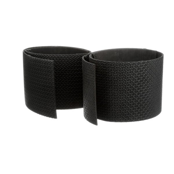 Two black rubber bands on a white background.