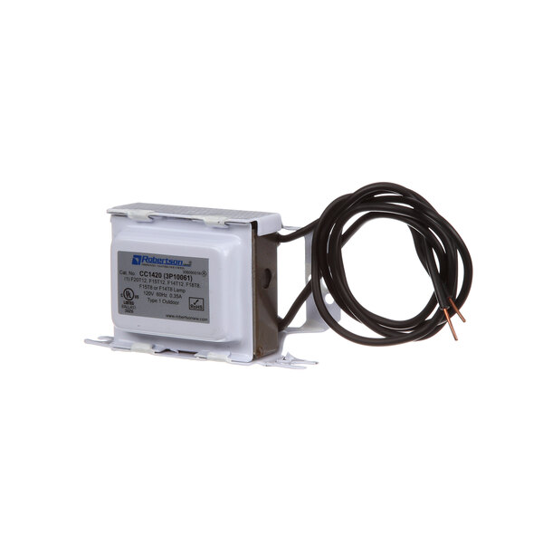 A white Hussmann ballast with black and white wires.