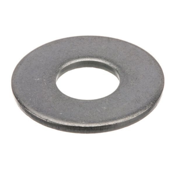 A close-up of a metal washer with a hole in it.