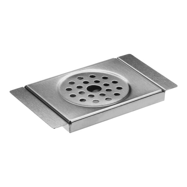A stainless steel circular metal drain cover with holes.