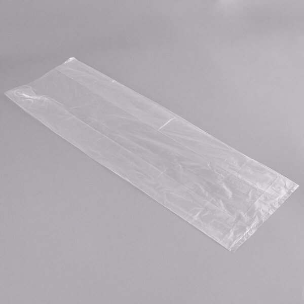 A clear plastic bag on a white surface.