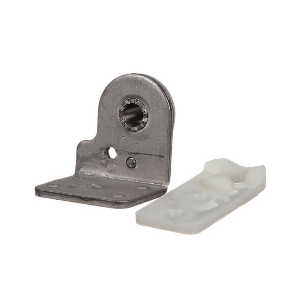 A white metal bracket with a white plastic piece on a Master-Bilt door hinge.