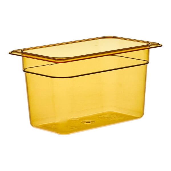 A yellow Cambro plastic food pan.