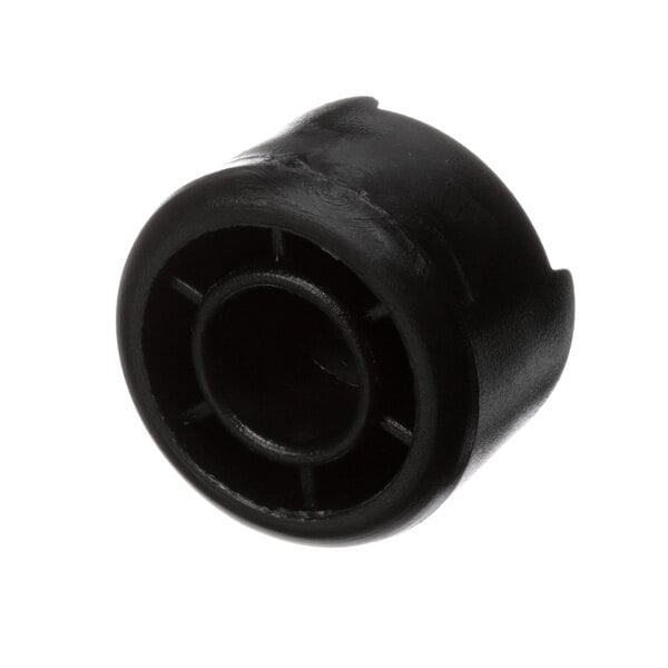 A black round plastic leg with holes.