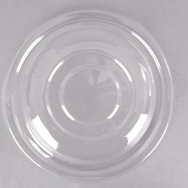 A clear plastic Fineline bowl with a clear plastic dome lid.