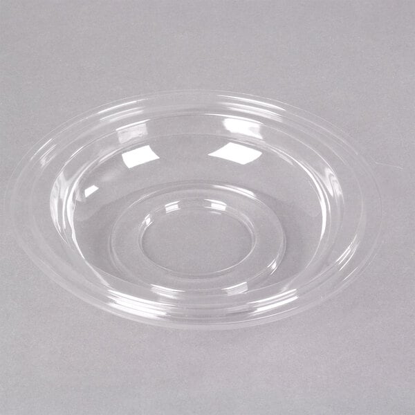 a clear plastic plate with a circle