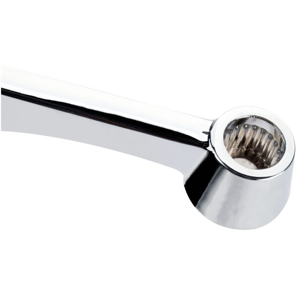 A close-up of an Advance Tabco wrist handle for a faucet with a metal pipe on it.