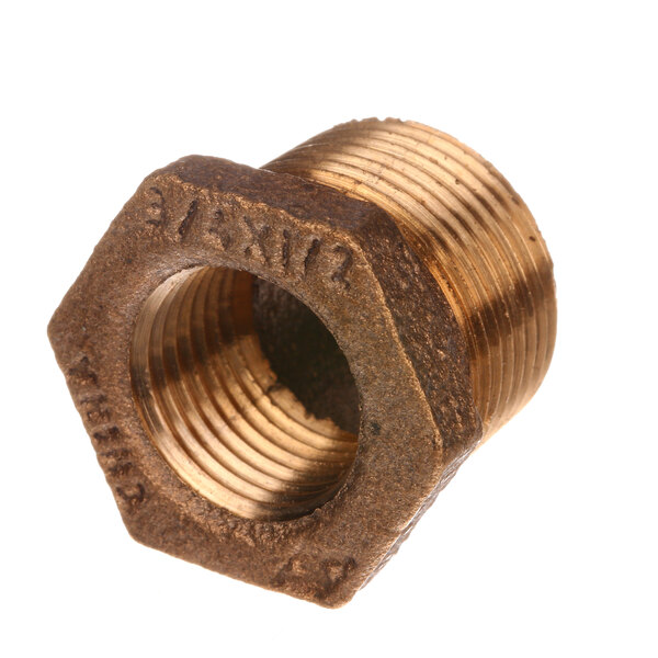 A close-up of a brass Jackson busing threaded nut.