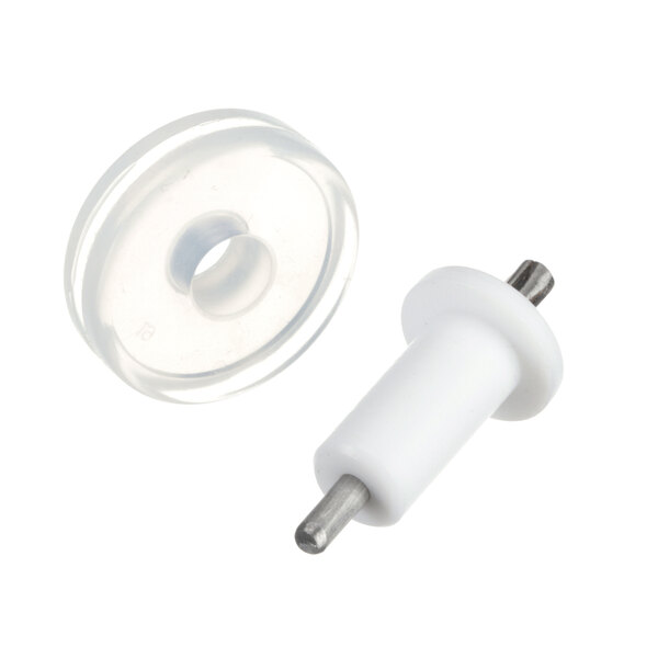 A white plastic and metal Newco probe with a rubber ring.