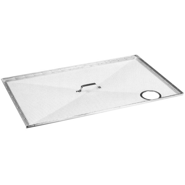 A stainless steel metal grid with a hole in the middle.