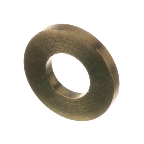 A close-up of a brass Arandela 50 washer.