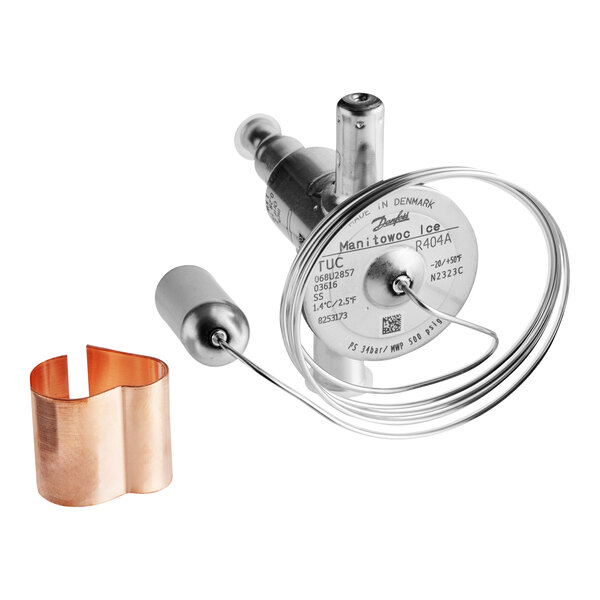 A Manitowoc Ice expansion valve with copper and steel components.