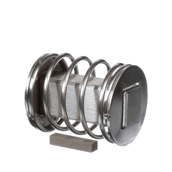 A metal cylinder with a metal ring on top and a key.