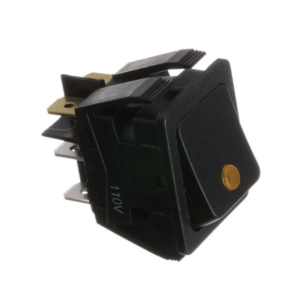 A close-up of a Newco momentary switch with a black toggle and yellow button.