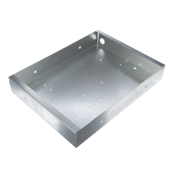 A metal box with holes, the Eagle Group heater cover, sitting on a table.