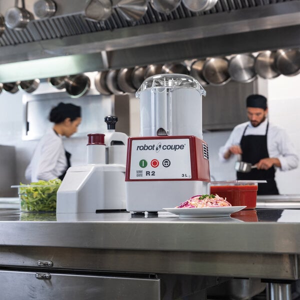 A stainless steel wall-mounted pot rack with a shelf, featuring 18 galvanized hooks and holding various kitchen containers and utensils.