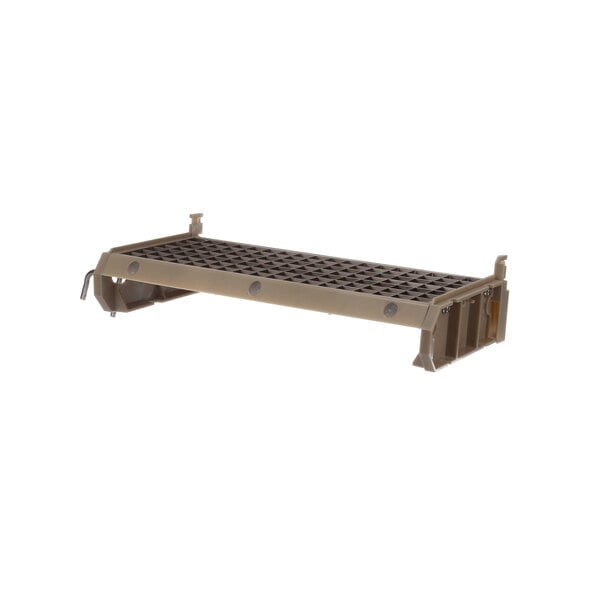 A tan metal Ice-O-Matic full cube evaporator shelf with holes.
