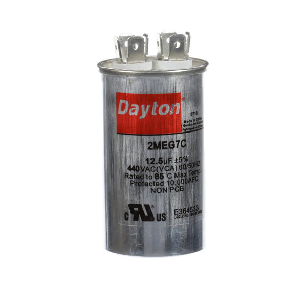 A round silver capacitor with red text that reads "Dayton" on it.