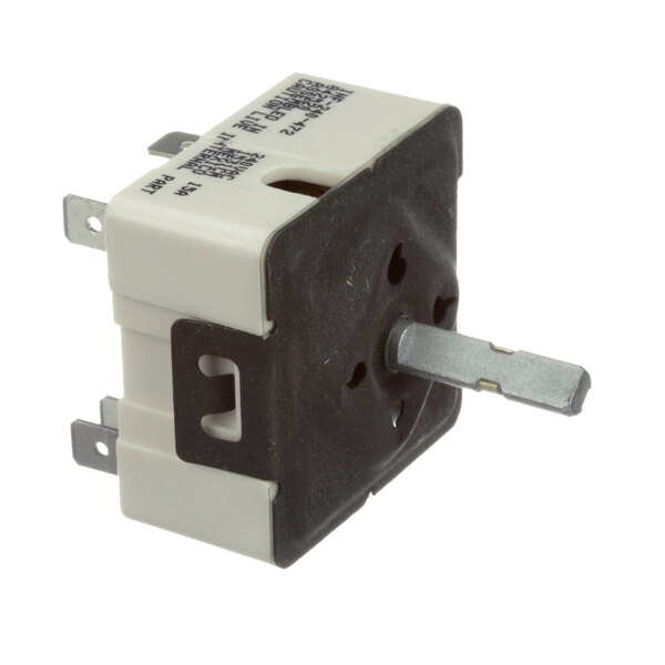 A close-up of a small black and white EmberGlo infinite switch.