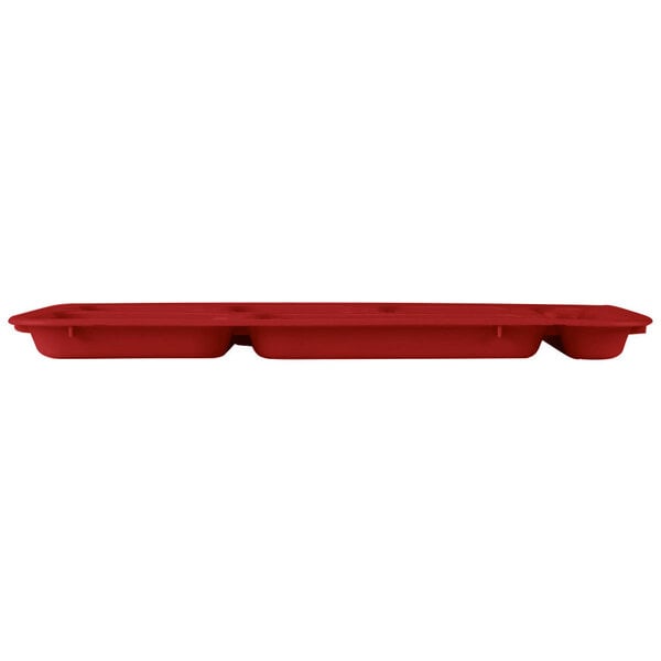 A red Cambro co-polymer serving tray with 6 compartments on a table.