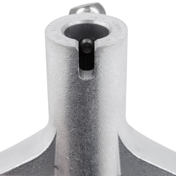 A close-up of a Hobart Legacy aluminum flat beater for 40 qt. bowls.