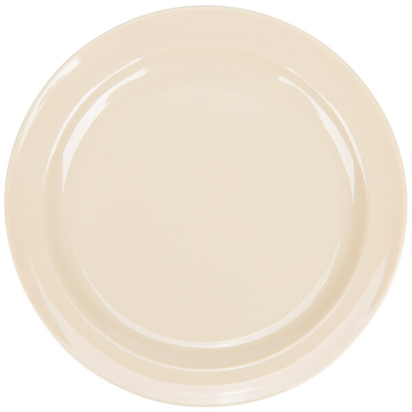 A white plate with a round rim.