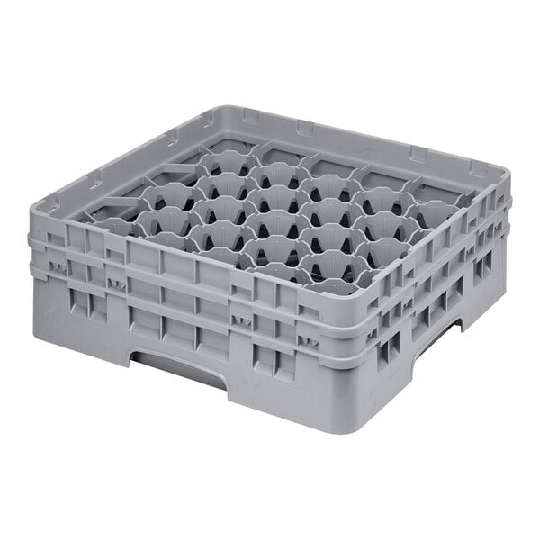 A soft gray plastic Cambro glass rack with 30 compartments.