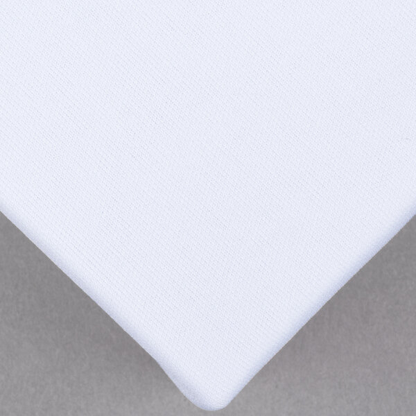 A white fabric box spring cover.