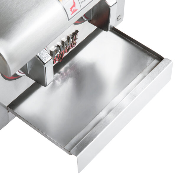 An APW Wyott dual burner countertop range on a stainless steel counter.