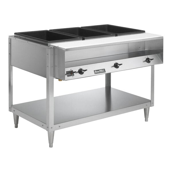 A stainless steel electric three-pan hot food table with a lower storage shelf.