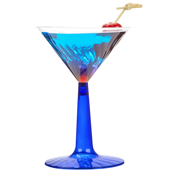 A Fineline Flairware plastic martini glass with a cobalt blue base filled with a blue drink and a cherry.