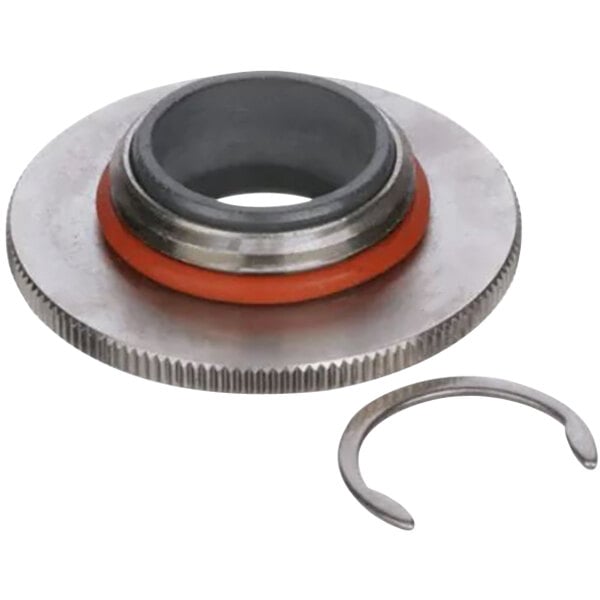 A circular metal Jackson Rinse Arm Bearing with a red ring.