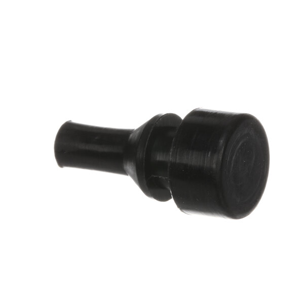 A black plastic object with a round cap on a white background.