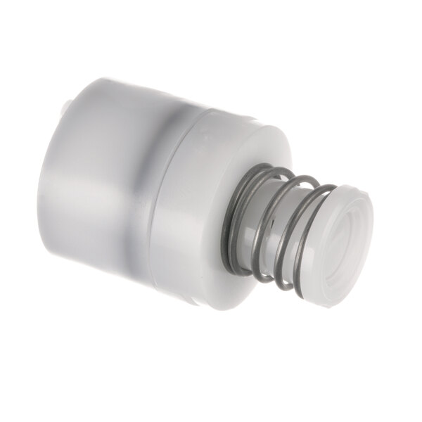 A close-up of a white plastic tube with a metal spring.
