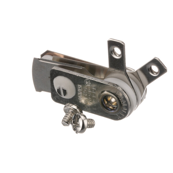 A close-up of a Gold Medal thermostat metal piece with screws.