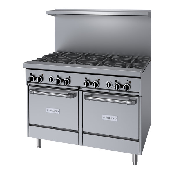 A stainless steel Garland commercial gas range with 8 burners and 2 ovens.