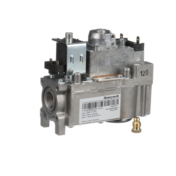 A Blodgett gas valve with a metal housing and brass valve.