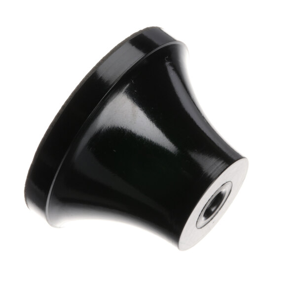 A black plastic lid knob with a round center and a hole.