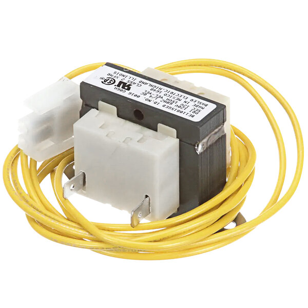 A close-up of a Moffat transformer with a white and black device.