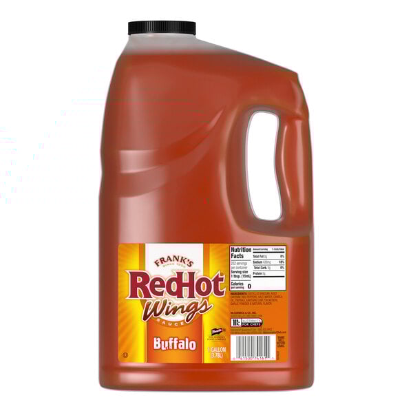 A 1-gallon jug of Frank's RedHot Original Buffalo Wing Hot Sauce.