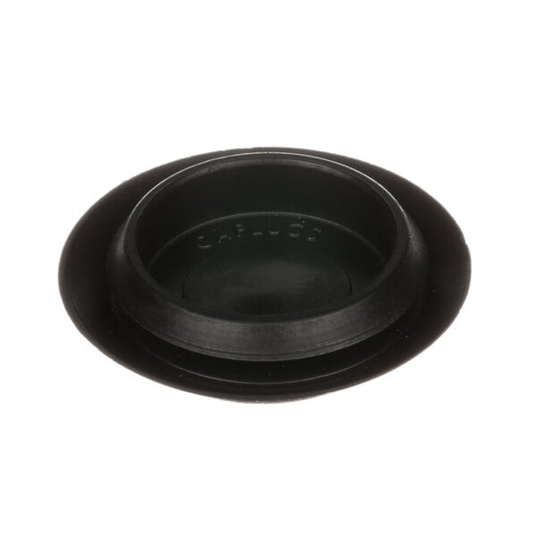 A close-up of a black plastic Jackson drain plug.