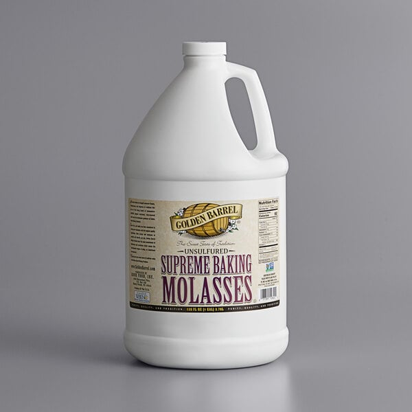A white jug of Golden Barrel Supreme Baking Molasses with a handle.