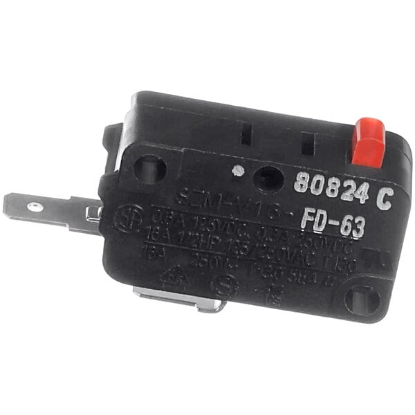 A black electrical device with black and red switches and a metal pin.