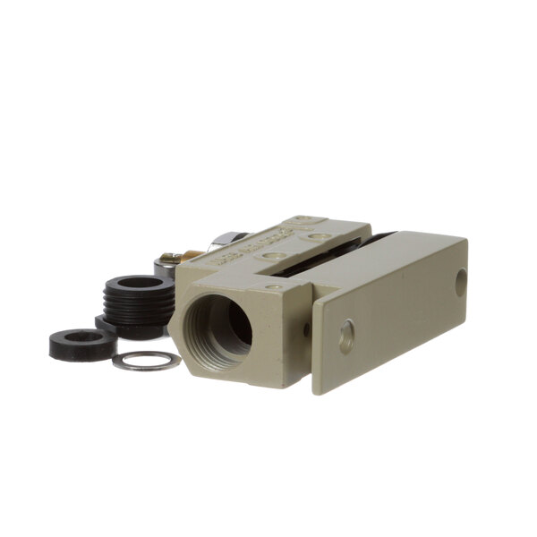 A beige Mars Micro Leaf Switch connector with a black round object and black thread.