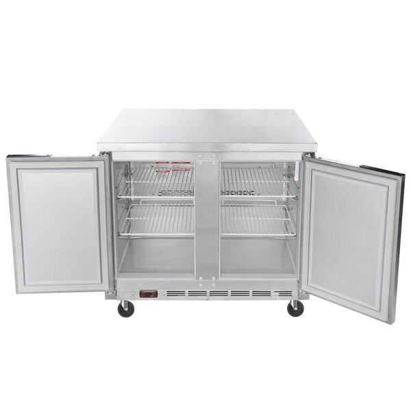 A stainless steel Beverage-Air undercounter refrigerator with two doors.