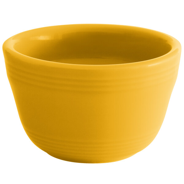 A yellow Tuxton China bouillon bowl.
