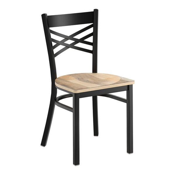 A black metal cross back chair with a light wood driftwood seat.